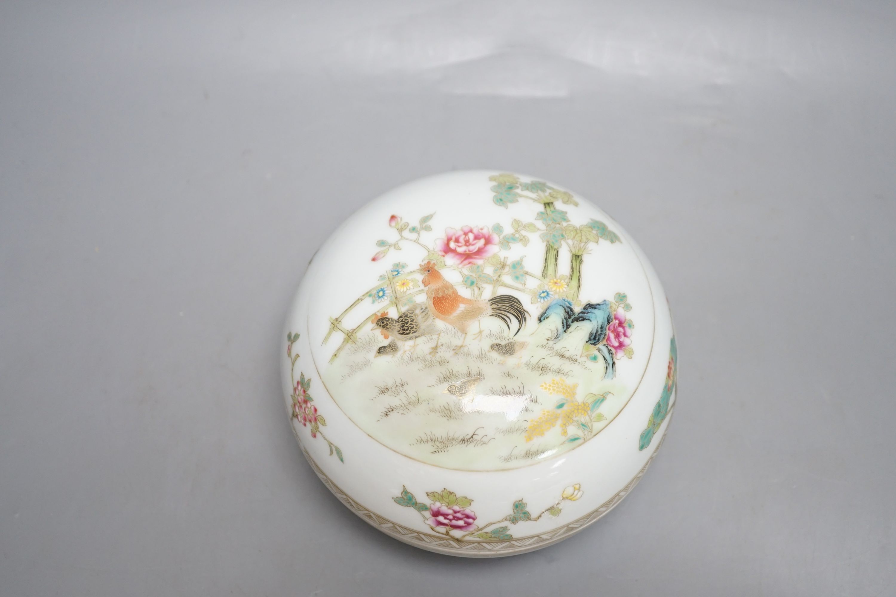 A Chinese famille rose’chickens’ box and cover, possibly Republic period, with mark, 13cms high.